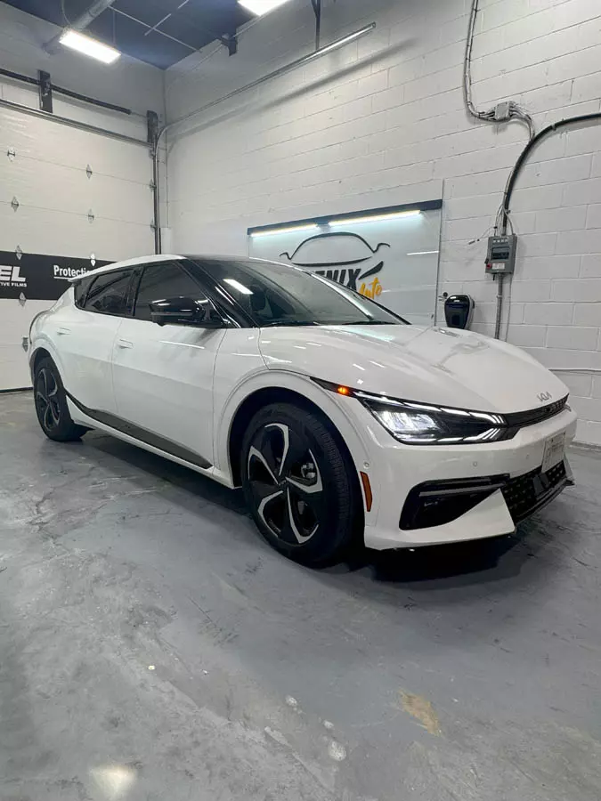 Ceramic window film installation on luxury car in Hamilton